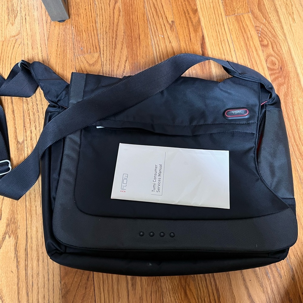 Tumi Black Messenger Bag with Professional Design